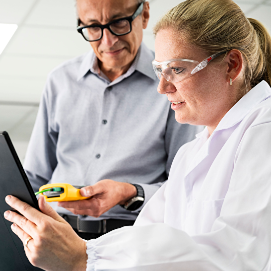 Integrated automation systems for genomics laboratories